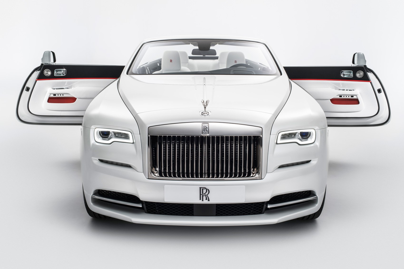 Rent this white Royce Rolls Dawn